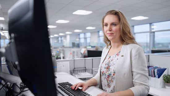 Woman at computer in an office